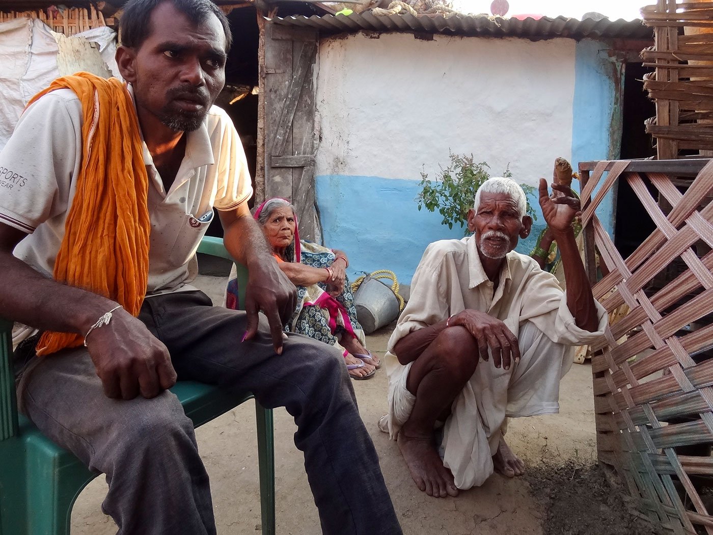 In Vedshi, T1 killed Gulabrao Mokashe, a Gond farmer in his 60s. His widow Shakuntala, his elder brother Natthuji and son (seated on the chair) Kishor, who is just been appointed as a forest guard, narrate their tale – of the tiger and their fears