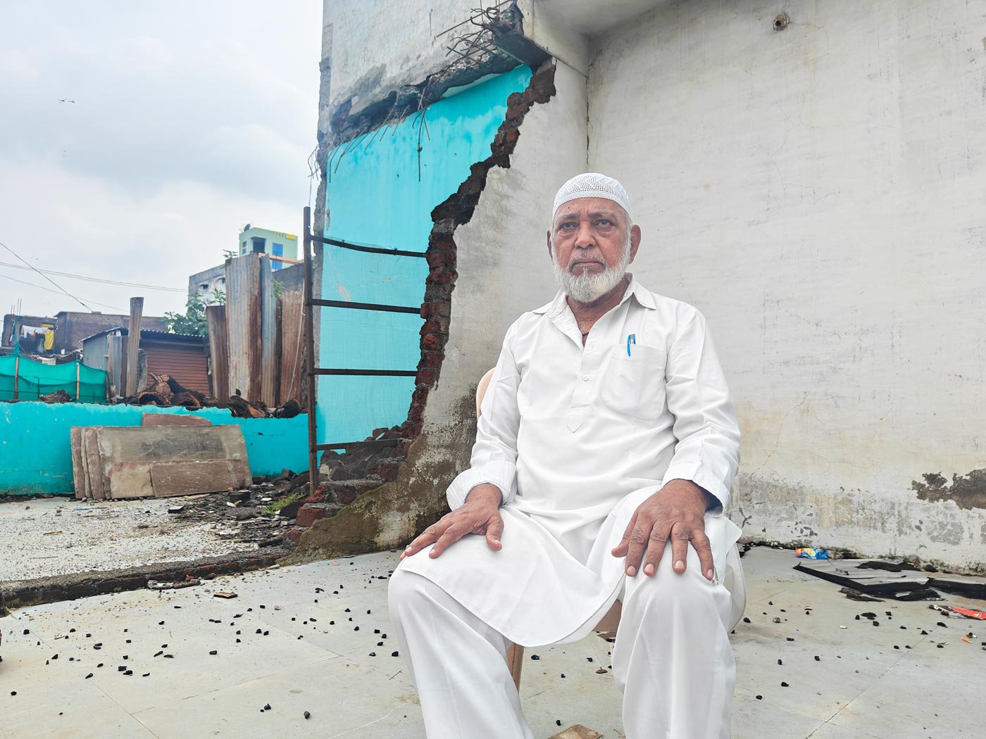 Rafique in front of his now destroyed shop in Khargone. A PUCL report says, 'even though both communities were affected by the violence, all the properties destroyed by the administration belonged to Muslims'.