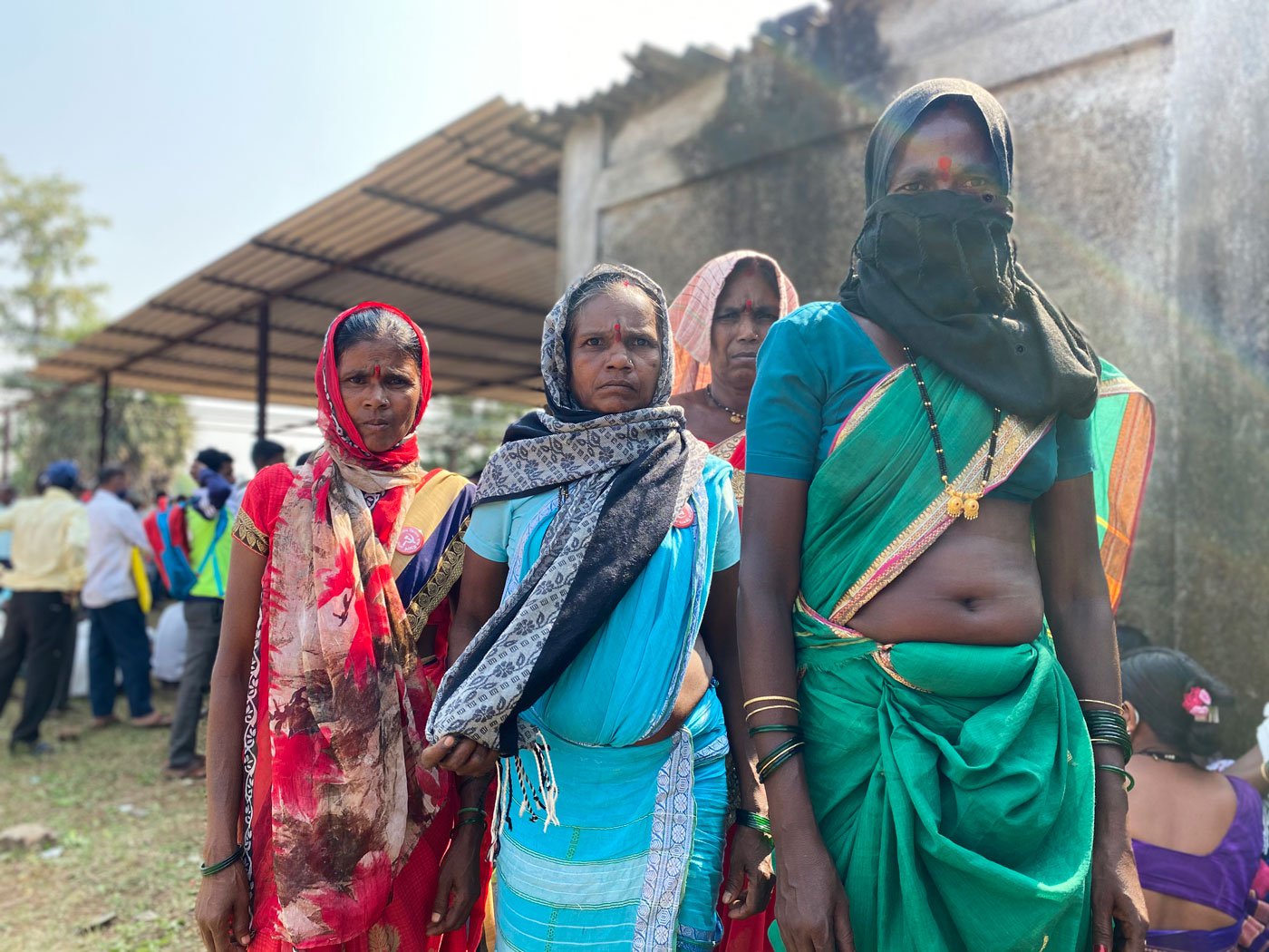 Renuka Kaluram (on the right, in a green saree) earns 150 rupees a day as an agricultural labourer in Paghar’s Karanje village. She has three small children who attend the local anganwadi: We want the government to stop online studies. Our children are not learning anything online. We don’t have big phones and there is no signal in our area'

