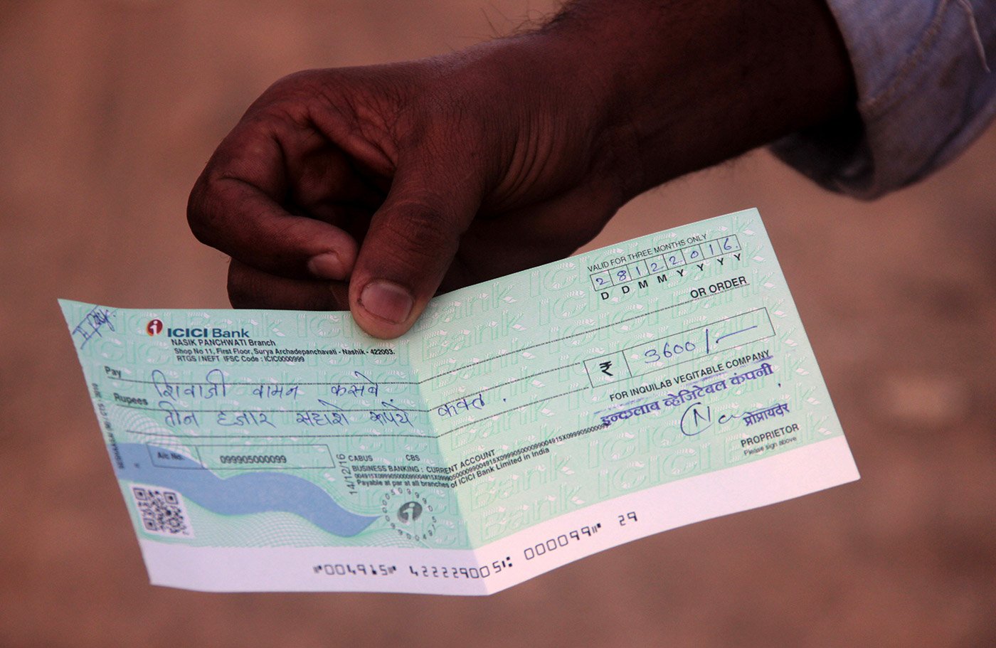 A cheque in the name of Vijay Kasbe's father – he was forced to take one since his trader did not have currency, but would be helpless if it bounced 