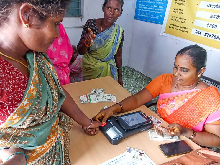 The ‘mini bank’ is one person – in Cherukkanur, it's Krishnadevi, who helps customers check their account balance and withdraw or deposit cash, using a biometric device Right: S. Sumathi, who runs a small shop in her one-room house, was stunned when she learnt about the overdraft facility