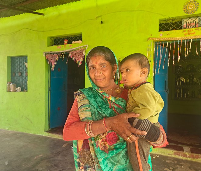 Left: Ramkumari with her grandchild in their house in Khorghar and (right) outside her home. Her son Hemant was a victim of the fraud. While they did not suffer financial losses, the rumour mills in the village claimed they had declared Hemant dead on purpose to receive the compensation. ' I was disturbed by this gossip,' says Ramkumari, 'I can’t even think of doing that to my own son'