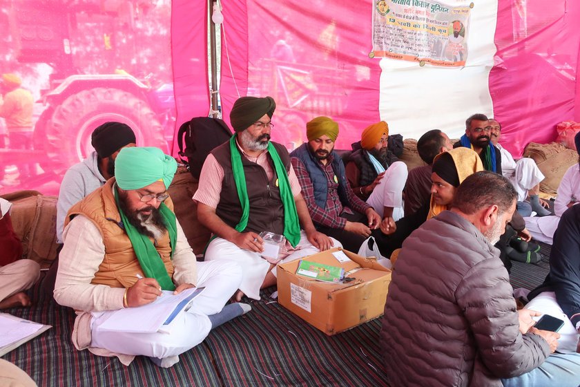 Left: Farmer unions have started providing signed IDs to journalists after several were attacked by miscreants. Farmer leader Ranjit Singh Raju (centre) notes down details of journalists and informs them about the volunteers to help them in any situation.