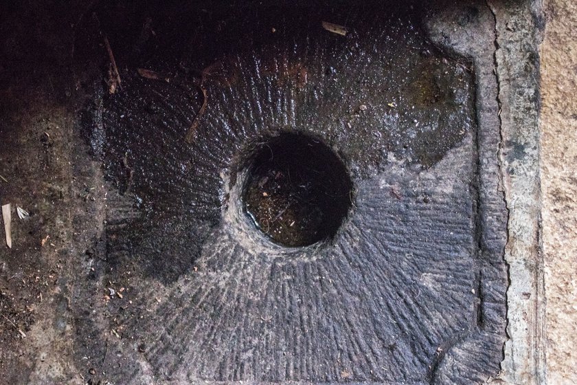Left: Ukhal – a mortar carved out of black stone – is fitted into the floor of the hall and is 6-8 inches deep.