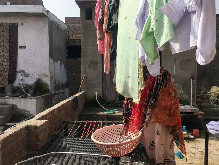 Sukhbir Kaur completing her household chores before leaving for work. ‘I have to prepare food, clean the house, and wash the clothes and utensils’