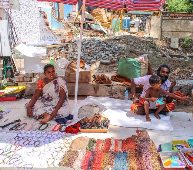 People from Narikuruvar community selling trinkets near the Meenakshi Amman temple in Madurai