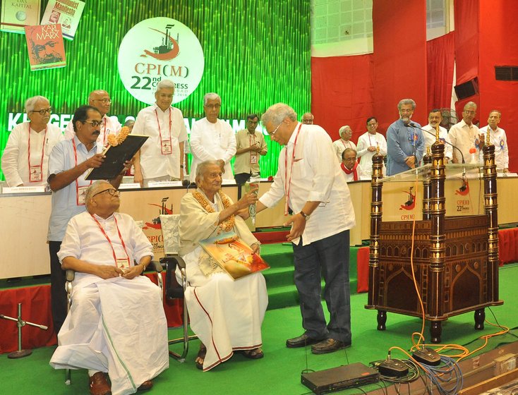 Left: DMK leader M.K. Stalin greeting Sankariah on his 98th birthday in 2019. Right: Sankariah and V.S. Achuthanandan, the last living members of the 32 who walked out of the CPI National Council meeting in 1964, being felicitated at that party’s 22nd congress in 2018 by party General Secretary Sitaram Yechury

