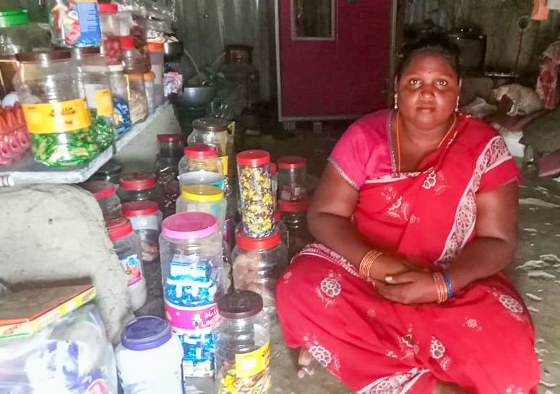 The ‘mini bank’ is one person – in Cherukkanur, it's Krishnadevi, who helps customers check their account balance and withdraw or deposit cash, using a biometric device Right: S. Sumathi, who runs a small shop in her one-room house, was stunned when she learnt about the overdraft facility