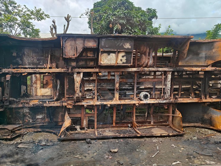 The charred remains of vehicles set on fire near the Churachandpur-Imphal border