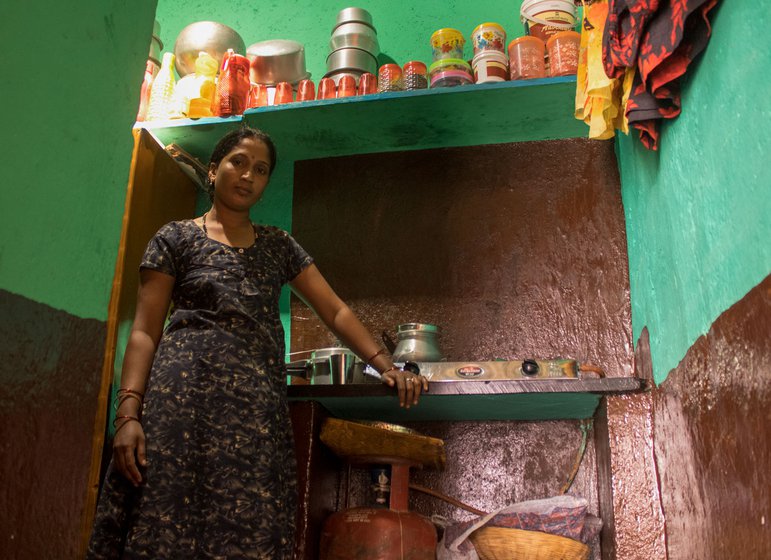 Standing in her kitchen, where the meals she cooks are often short of pulses and vegetables. ‘Only if there is money left [after loan repayments] do we buy vegetables’