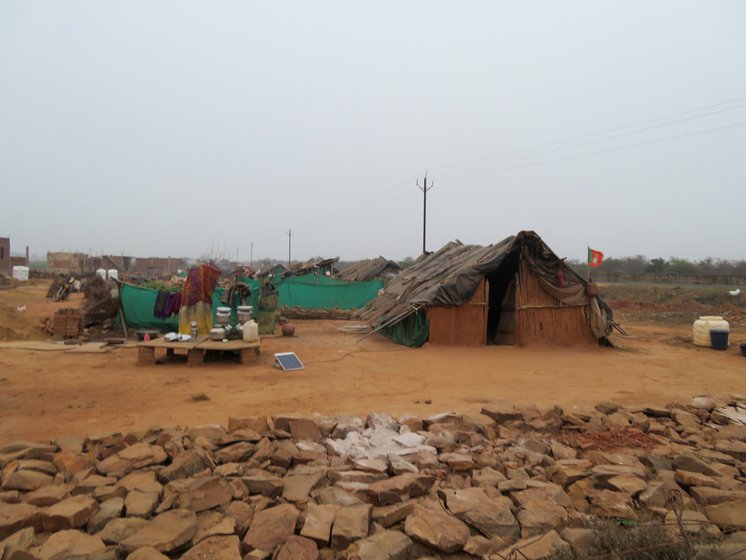 The residents of Bagcha moved to their new home in mid-2023. They say they have not received their full compensation and are struggling to build their homes and farm their new fields