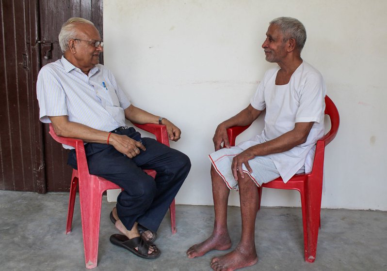 Right: Surendra Nath Awasthi and Jagdish Prasad Tyagi talking at Tyagi's house in Azad Nagar, Hardoi