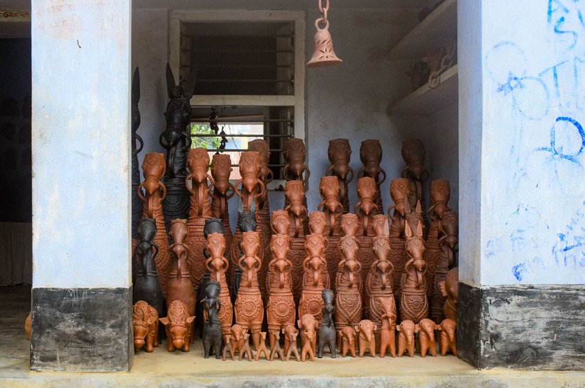 In the potter's colony in West Bengal's Panchmura village, local Adivasi communities were the only buyers during the lockdown for traditional votive horses (right)

