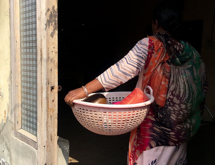 Sukhbir Kaur completing her household chores before leaving for work. ‘I have to prepare food, clean the house, and wash the clothes and utensils’