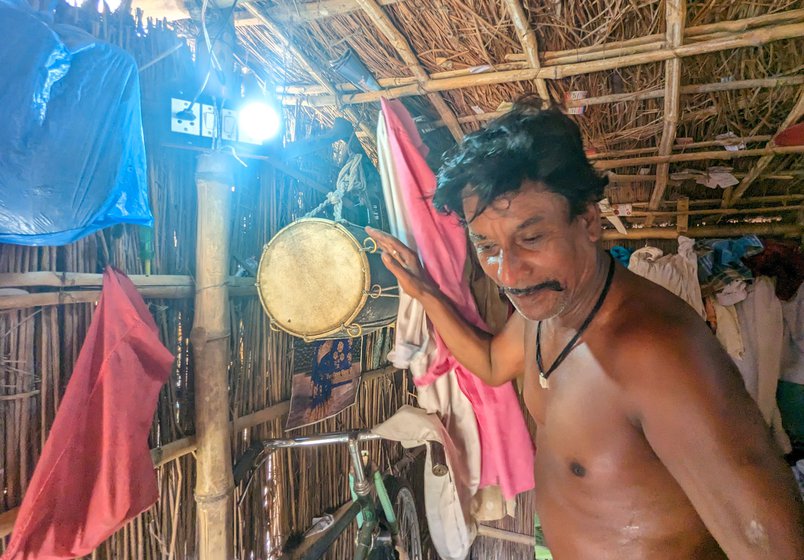 After a performance, the musician loosens the leather ropes on his dholak and hangs it back on the wall