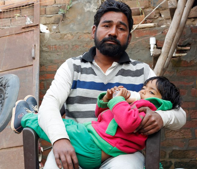 Three-year-old Gurpyar and her father, Satpal Singh