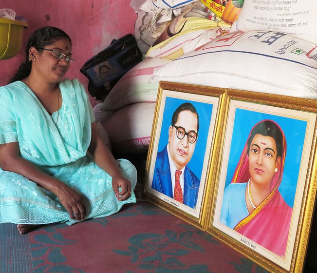 Sunita Bhosle with Ambedkar and Savitribai Phule’s photo