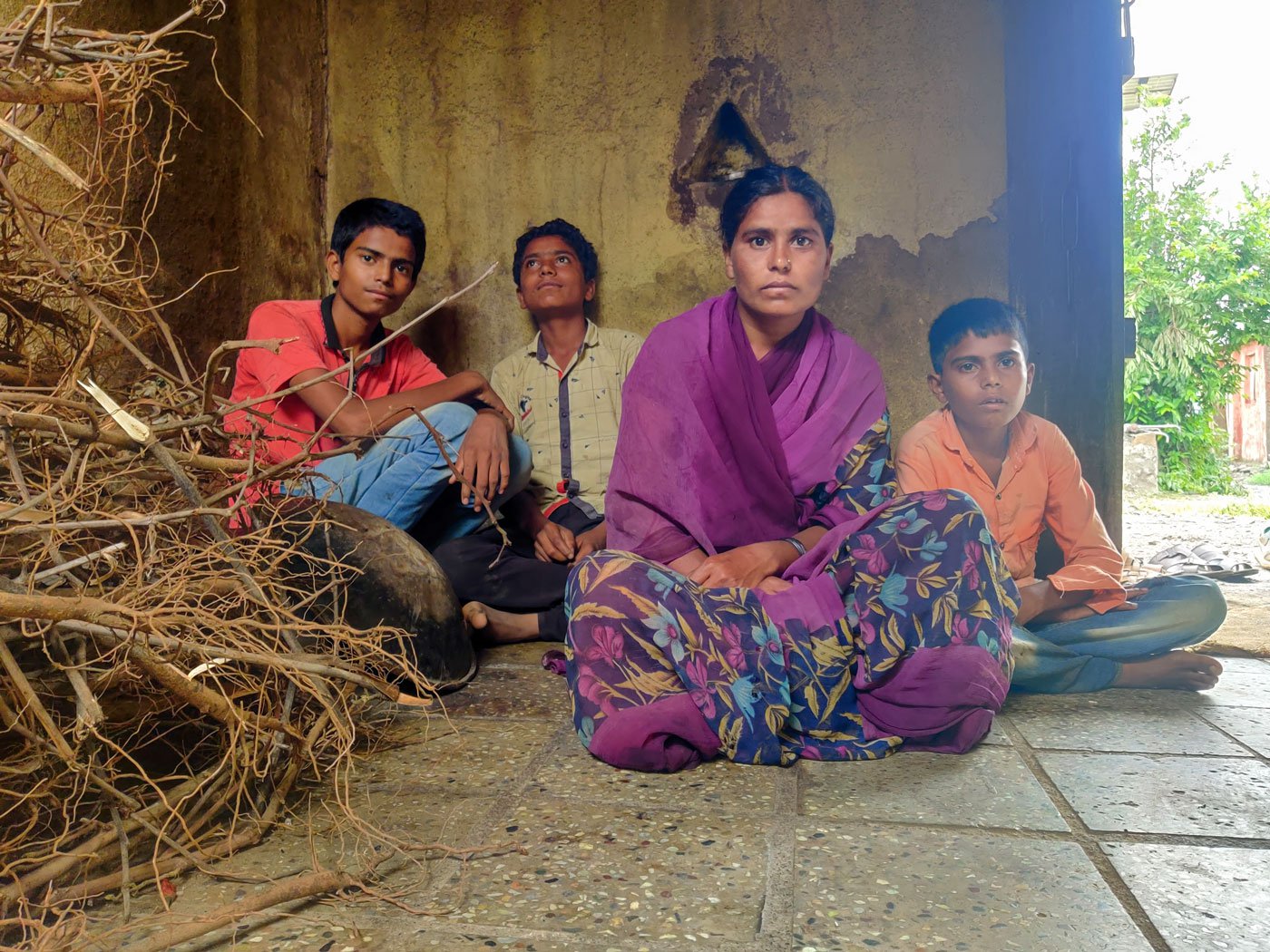 Archana.Mandwe with her children, (from the left) Akshay, Vishal and Mahesh, in Mhasewadi village