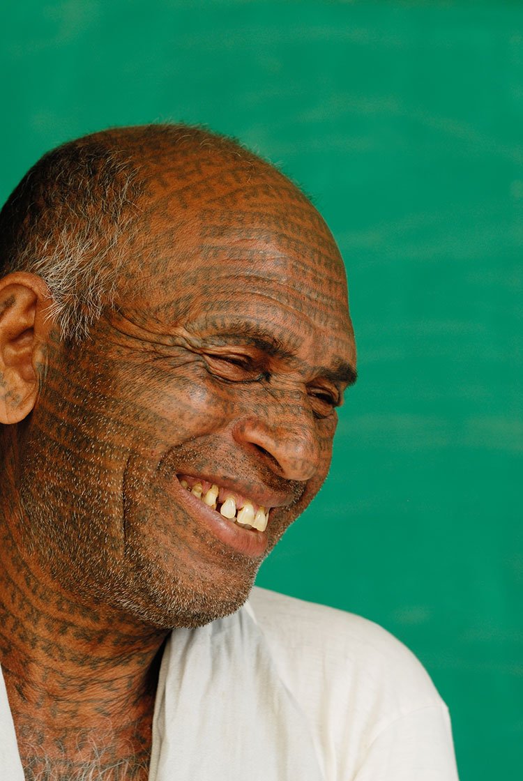 Man with tattooes on his face