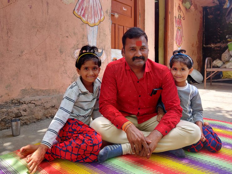 Left: Gopal Shinde with his daughters. Right: Gopal's friend standing in his water-filled farm last October