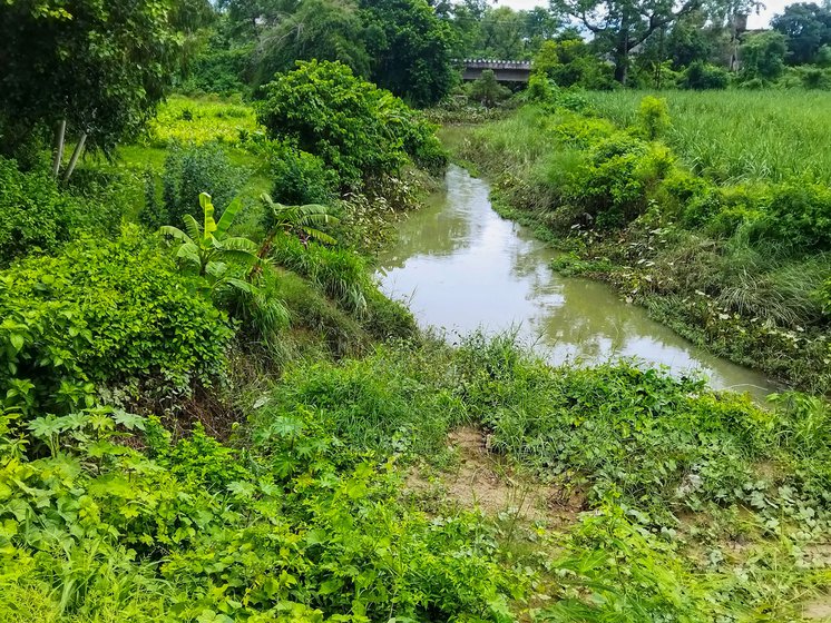 The Parvin river (left) flows through the village of Jhankat and the area around (right) is littered with pads and other garbage