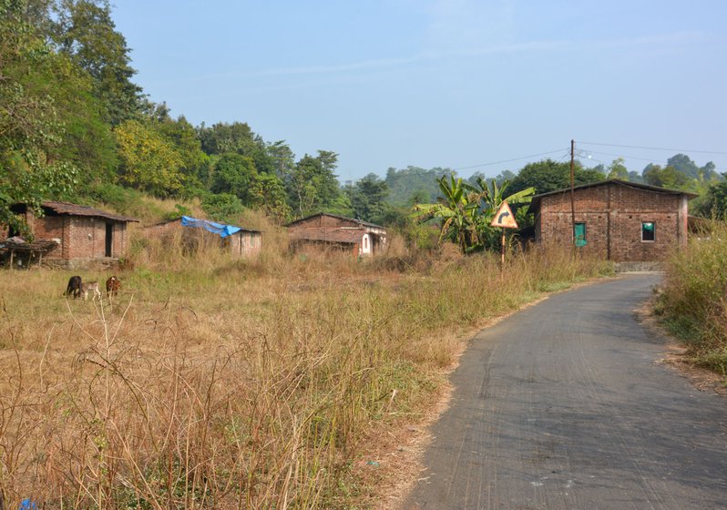 Houses at the foot of Saparya hill, which the government claims is on forest land and ineligible for compensation