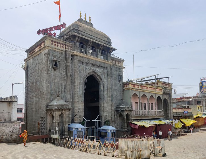 Nagesh Salunkhe has been losing out on the earnings from performing poojas in the Tuljapur temple (right)