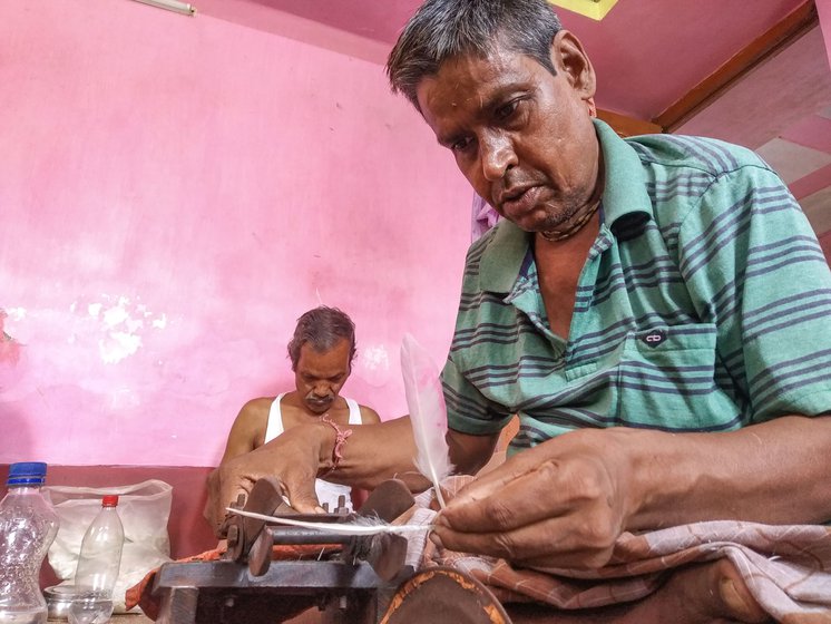 Right: 'The feathers which are approximately six to ten inches long are cut to uniform length,' says Shankar Bera