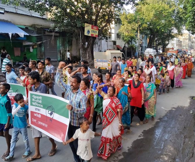 Left: The eviction notice, pasted on November 6. A poster calling for a meeting on November 18 to demand proper and permanent rehabilitation of evicted families. Right: The Tallah basti residents at a protest march on November 11