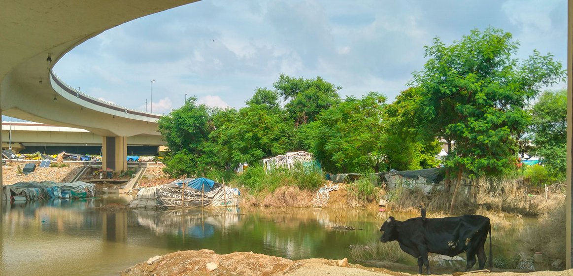 Flood waters entered homes under the flyover near Mayur Vihar metro station in New Delhi