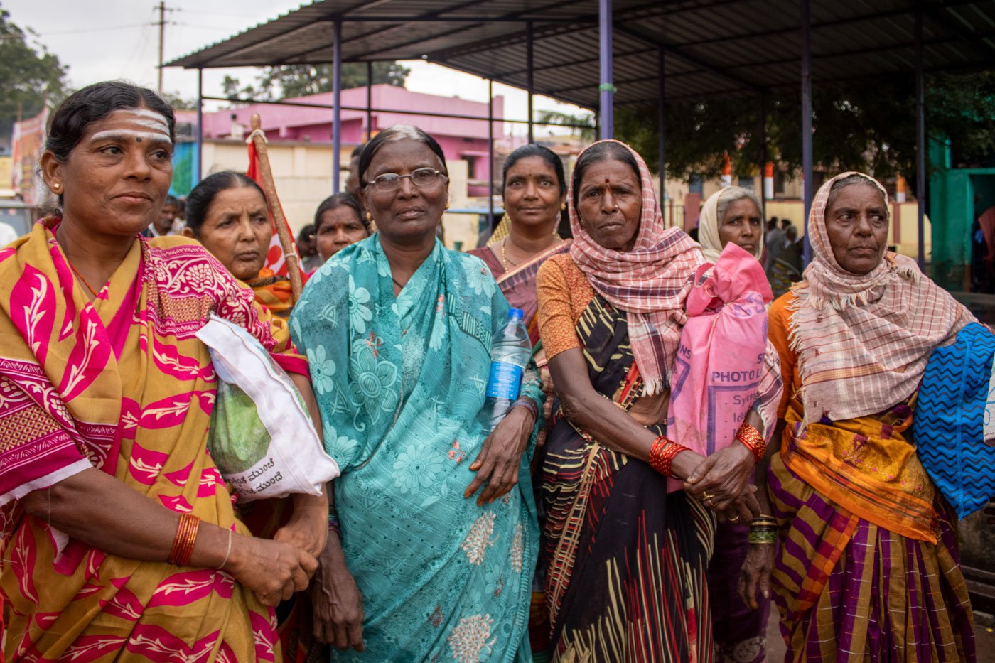 Hanumakka Ranganna (second from left) and Hampakka Bheemappa (third from left) along with other women mine workers all set to continue the protest march, after they had stopped at Vaddu village in Sandur to rest