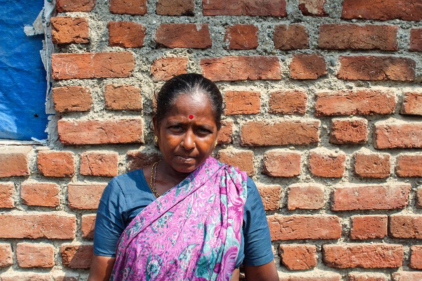 Suman outside her home in Palghar's Umela village