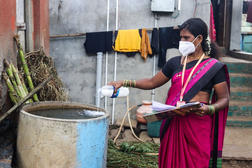 After the floodwater had receded, Shubhangi Kamble was tasked with disinfecting water (left) and making a list (right) of the losses incurred by villagers
