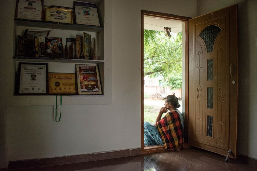 Varsha, a popular folk artist in Tamil Nadu who has received awards (displayed in her room, right), says 'I have been sitting at home for the last two years'
