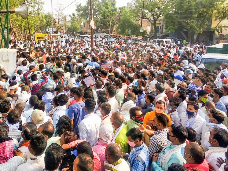 Bareilly (left) and Firozabad (right): Candidates and supporters gathered at the counting booths on May 2; no distancing or Covid protocols were in place