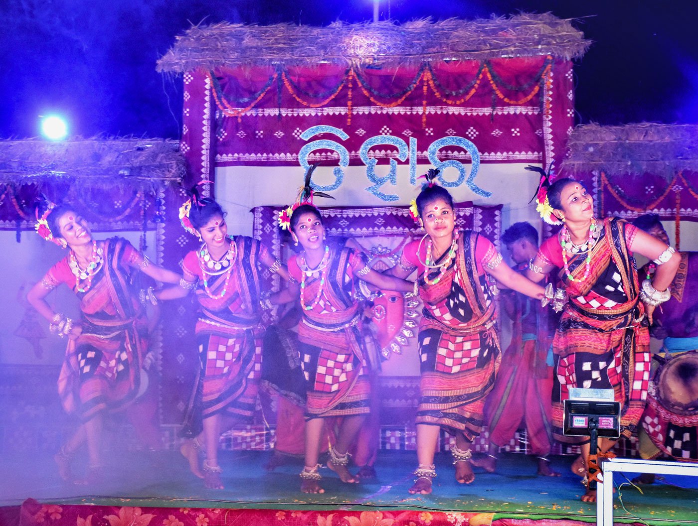 Five dancers from g roup Kalajibi during a performance in Sambalpur district.