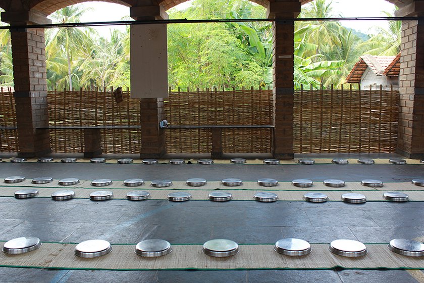 Left: In the open dining hall, there is silence before the storm. Right: Plates and mats just before the children storm in
