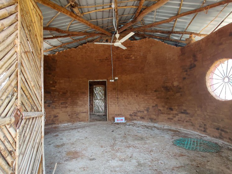 Left: Unlike community-built kurma ghars , the government huts are fitted with windows and ceiling fans.