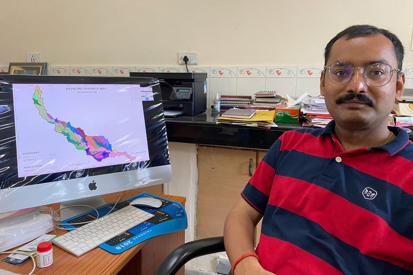 Left: Venkatesh Dutta sitting in front of his computer in his laboratory.