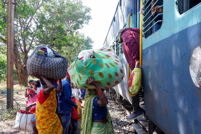 Carrying the loads on their heads, the two women walk for around 30 minutes to get to the station. The slow passenger train will take three hours to cover a distance of 44 kilometres. 'A whole day wasted on the journey alone,' Sakuni says