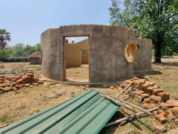 Right: A half-finished government kurma ghar in Krishnar village.