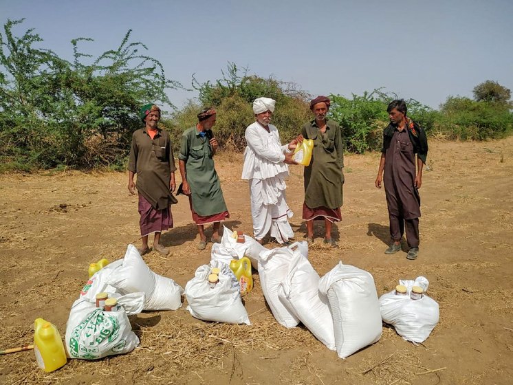 Left: Pastoralist families receiving ration bags from Bhikhabhai Vaghabhai Rabari, president of the Kachchh Unt Uchherak Maldhari Sangathan (Kachchh Maldhari Camel Herders Organisation). Right: Several Fakirani Jat families have received such ration kits from a Bhuj-based organisation working for the rights of the maldharis. The bags include essentials like wheat, lentils, cotton oil, turmeric, spices, salt and rice. The families say this has reduced the pressure on them greatly.


