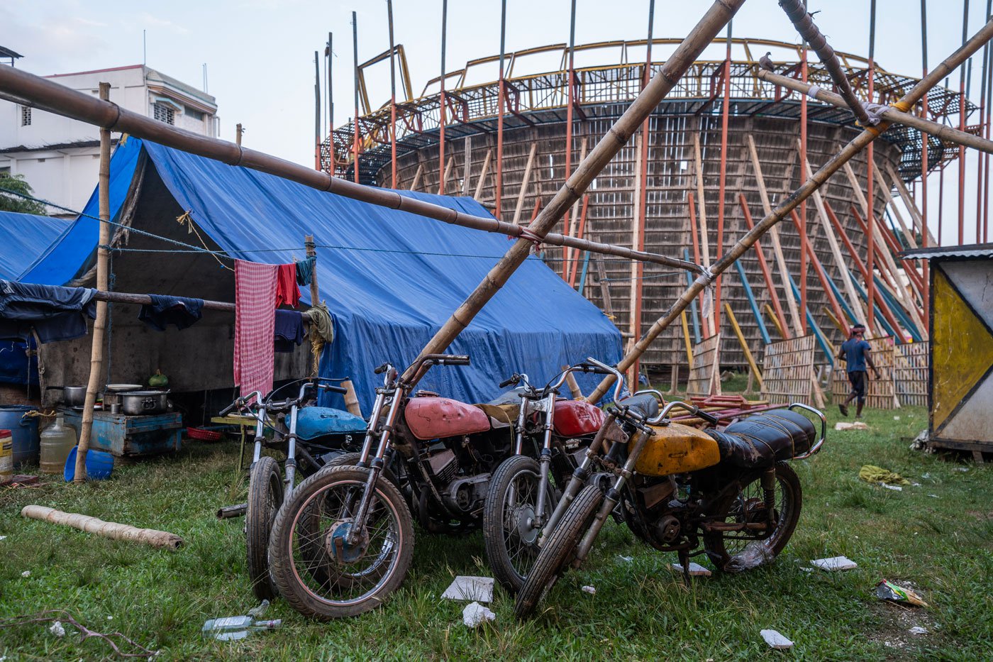 Four Yamaha RX-135 bikes, used in the act, are kept beside the makeshift camp where the riders live during the mela days. Rubel Sheikh says he has used these same motorcycles for more than 10 years now but are well-maintained and 'they get serviced regularly'