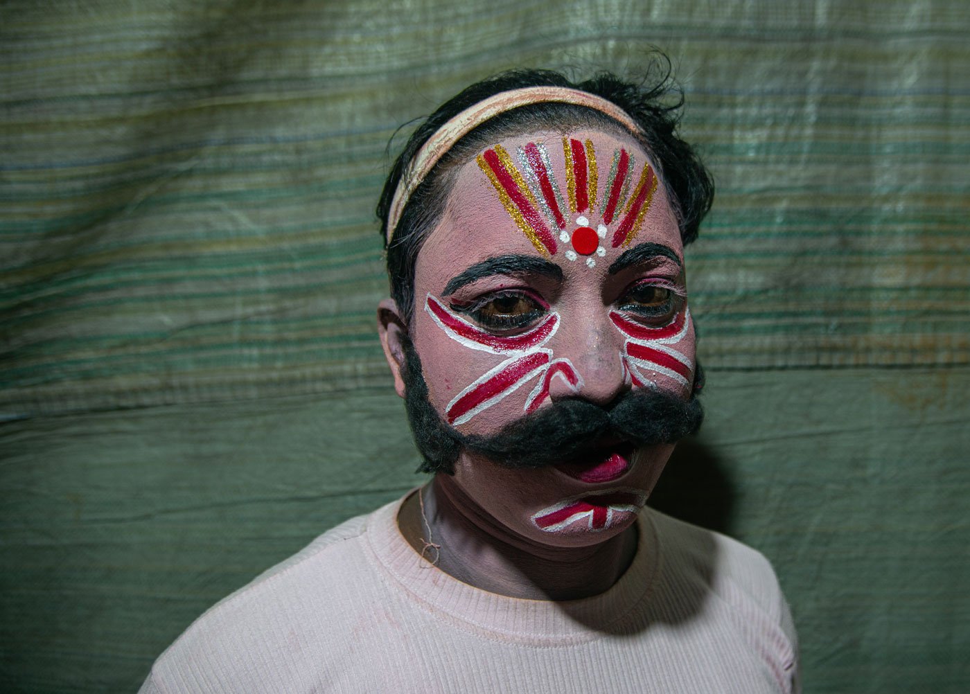 Portrait of Dilip Mandal in his attire of Dakkhin Rai