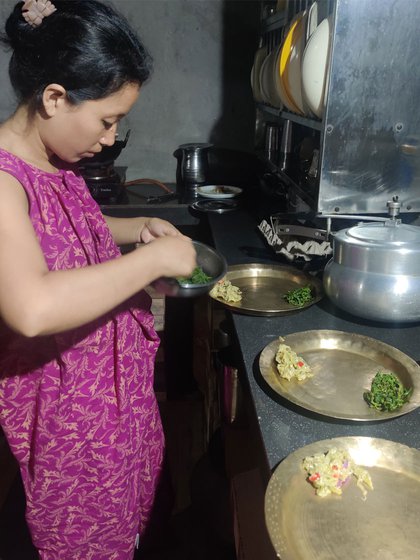 Left: Nayanmoni prepping the thali that's almost ready to be served