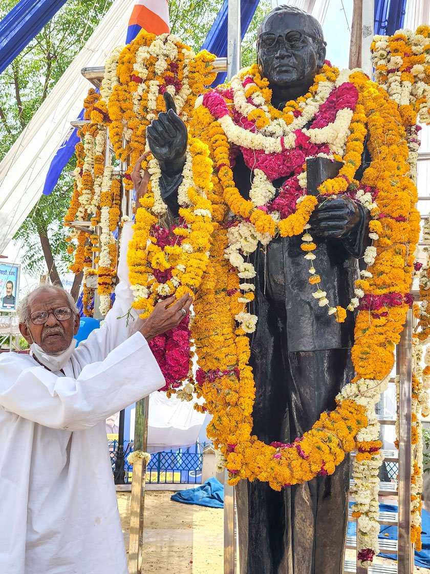 Shobharam Gehervar garlands the statue in Ajmer, of one of his two heroes, B. R. Ambedkar, on his birth anniversary (Ambedkar Jayanti), April 14, 2022