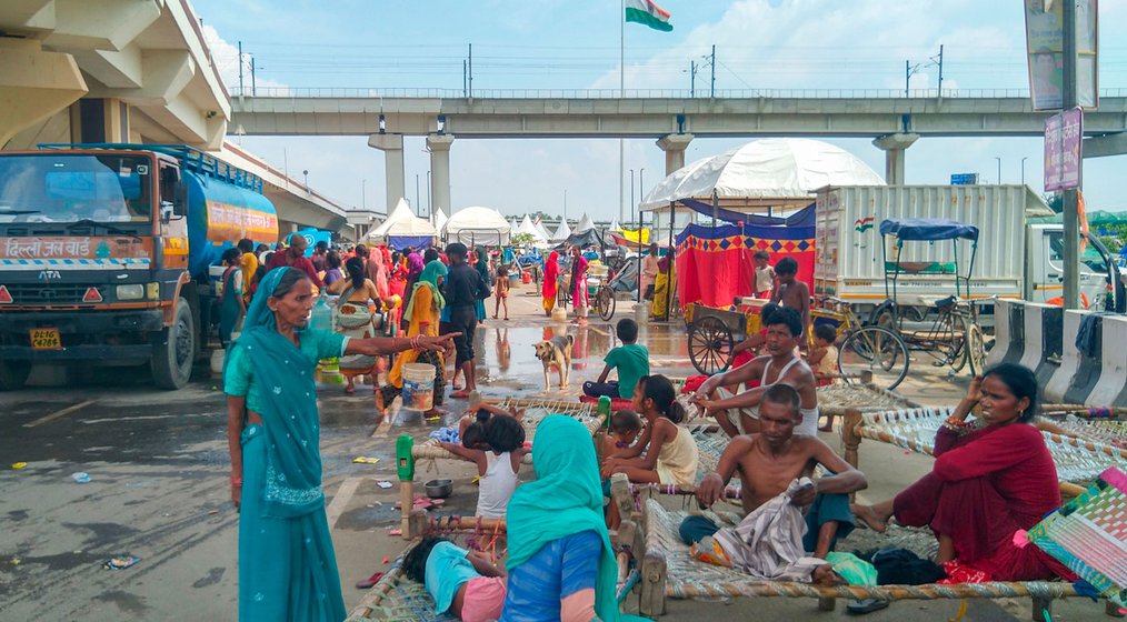 Left: Relief camp in Delhi for flood affected families.