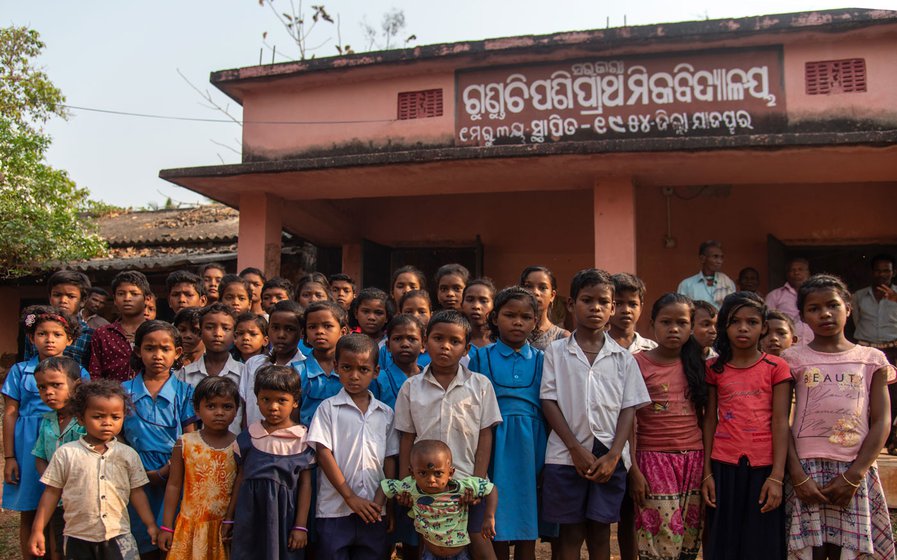 Students of Gunduchipasi outside their old school building