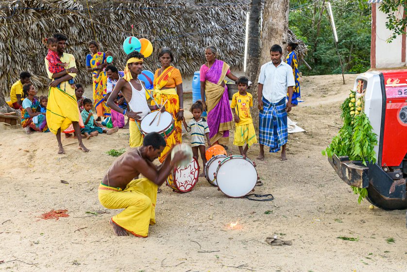 Left: The procession begins with the ritual of breaking open a white pumpkin with camphor lit on top.