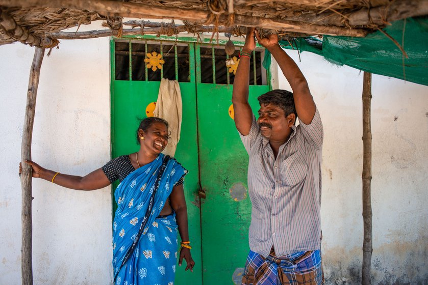 Visalatchi and Sakthivel standing outside their home (right). Sakthivel has been helping her with the business. Visalatchi is happy that  she could educate and pay for the marriages of her two daughters. However, she now faces mounting debts
